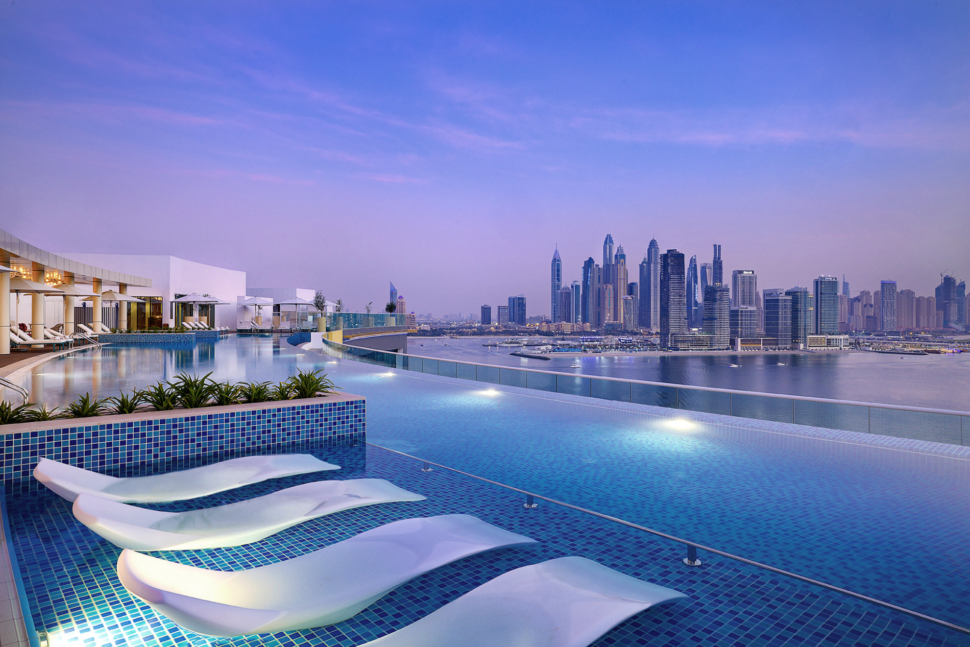 NH-Collection-Dubai-The-Palm-pool-and-skyline-view.